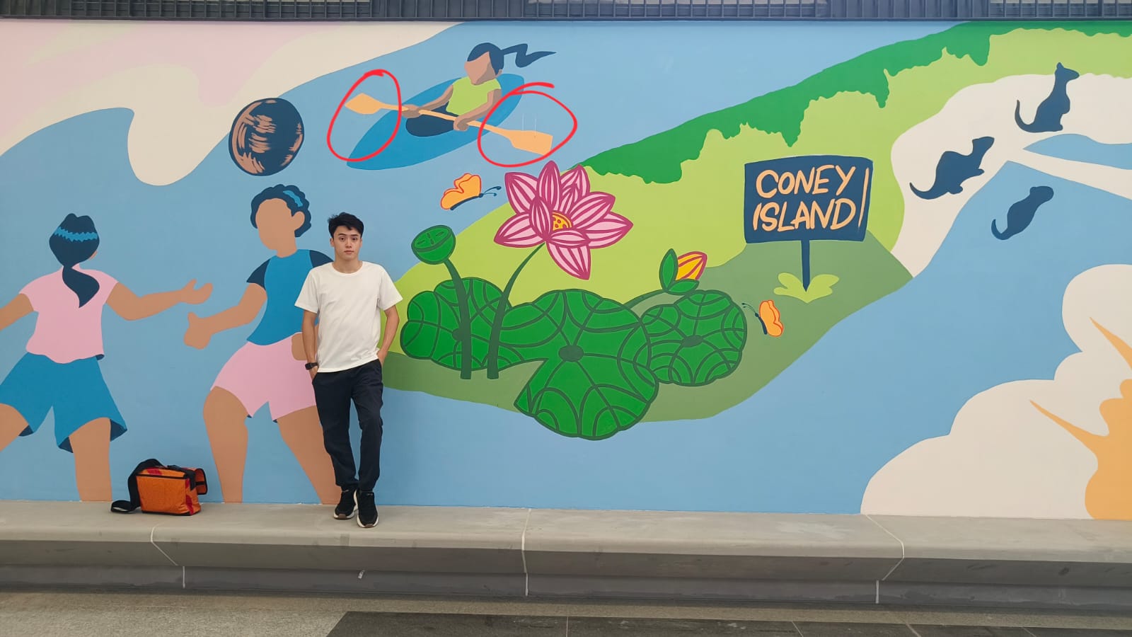 Behind the scenes photo of detailed brushwork on the wall